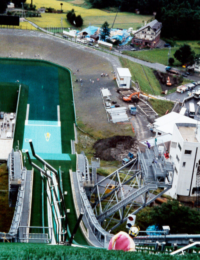 Hakuba Olympic ski jumping stadium twin towers with Mount Shirouma behind