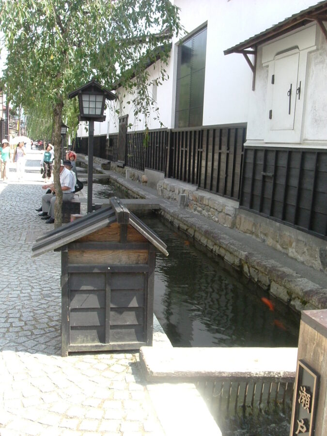 Hida Furukawa old town street with white-walled storehouses