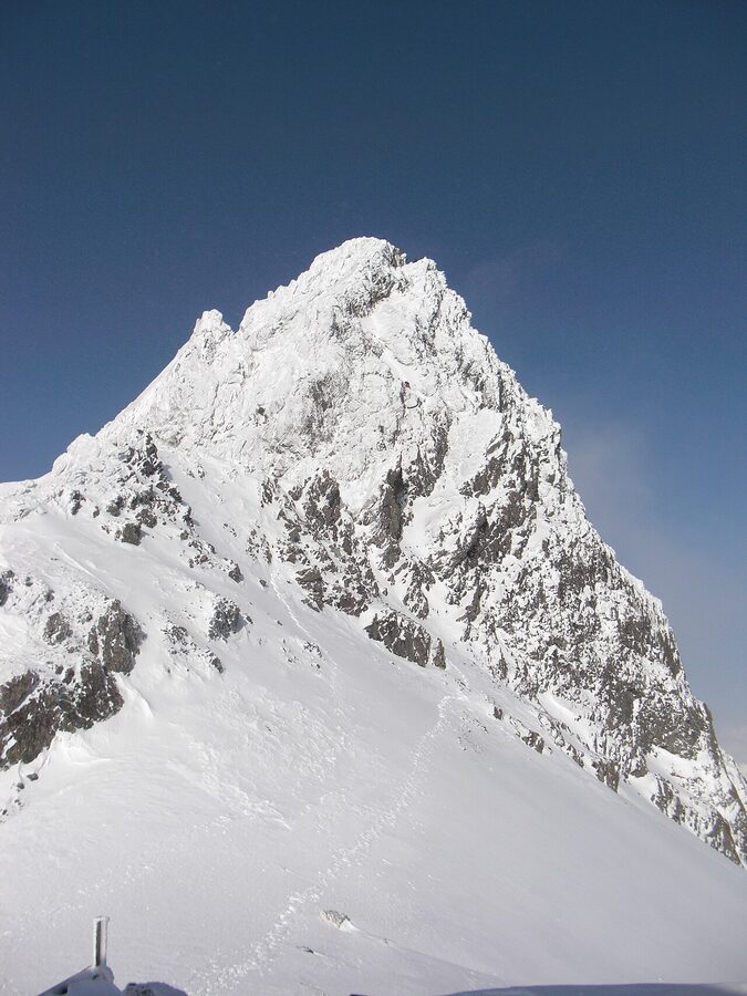 The summit of Mount Yari in snow, seen from Yarigatake Sanso mountain hut