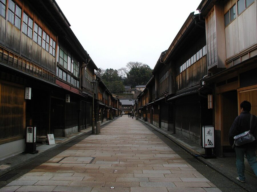 Higashi Chaya-gai geisha district street with kimono-style shops and dark wooden facades