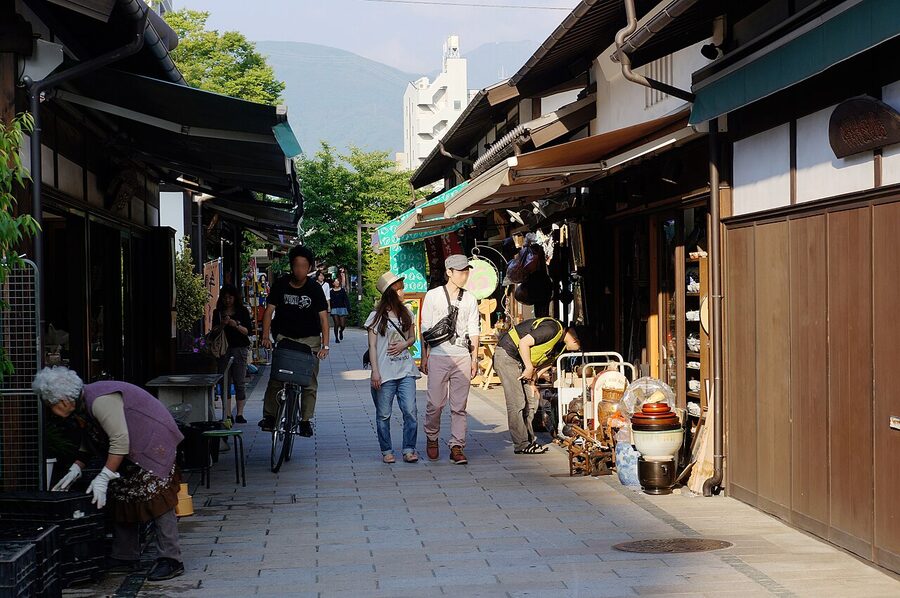 Nawate-dori shopping street in Matsumoto with independent shops and food stalls