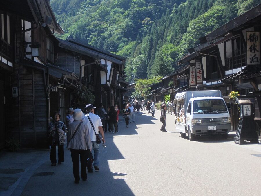 Narai-juku main street with traditional lanterns at dusk