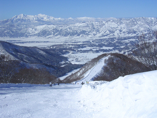Nozawa Onsen ski resort slopes with village below