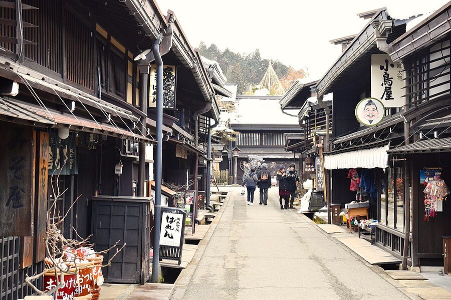 Daytime view of Hida Takayama old town streets with traditional machiya architecture