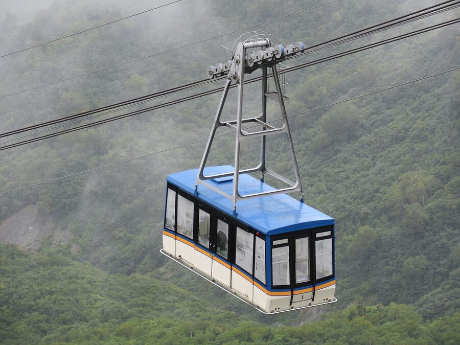 Tateyama Ropeway between Daikanbo and Kurobedaira with mountain backdrop