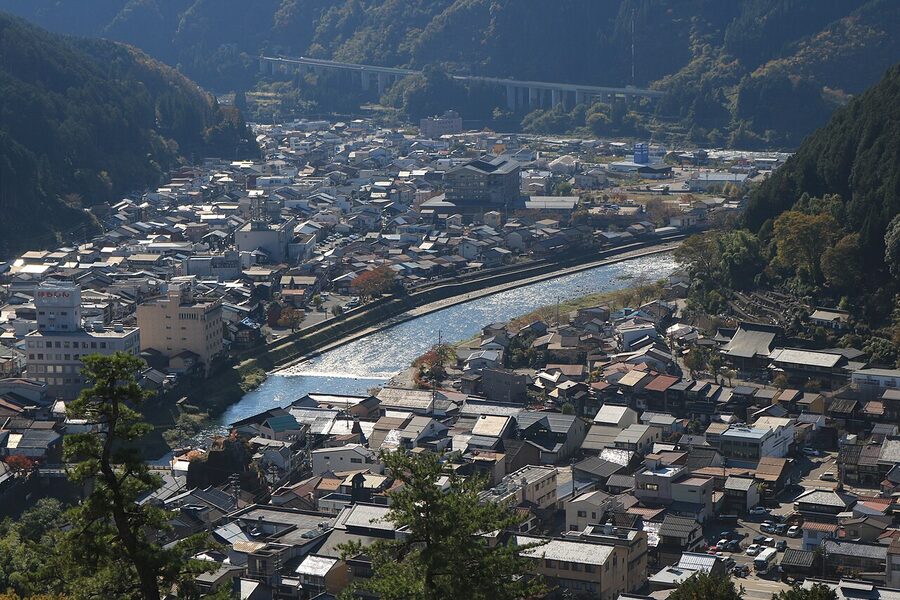 Yoshida River and autumn-coloured ridges seen from Gujo Hachiman Castle