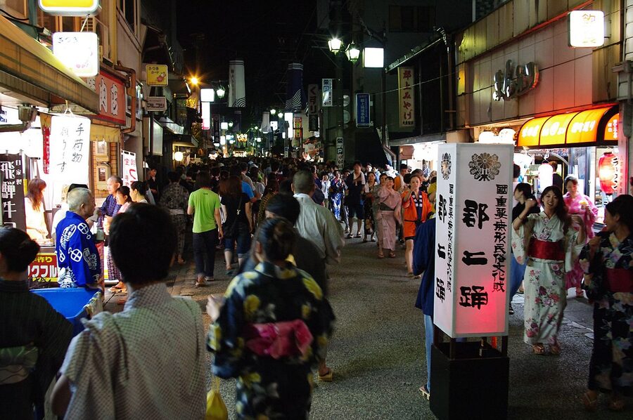 Tetsuya Odori dancers extending the dance floor down the street at night