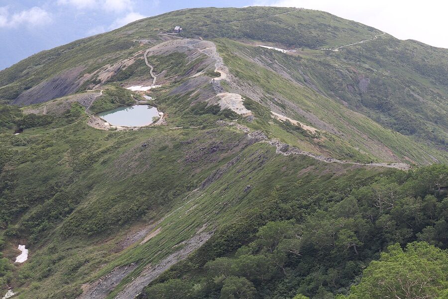 Happo Pond on Happo ridge with Shirouma reflection