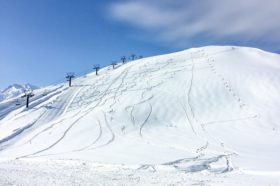 Snow tracks and chairlift at Hakuba in winter