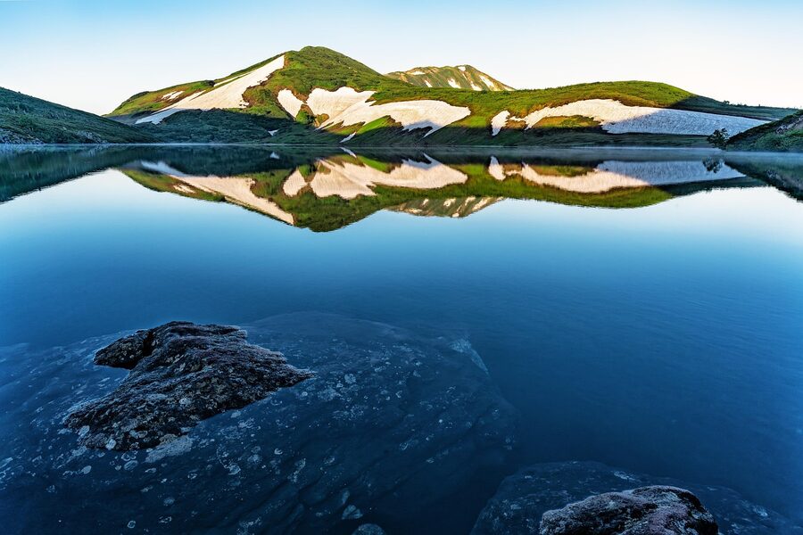Hakuba alpine zone with mountain pond reflection