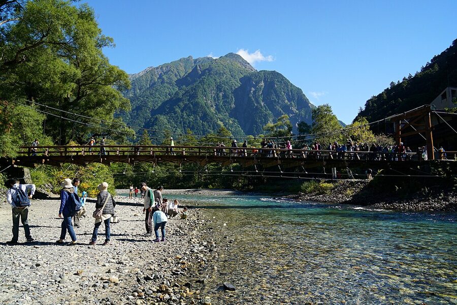 Kappa-bashi bridge over the Azusa river with the Hotaka peaks behind, Kamikochi
