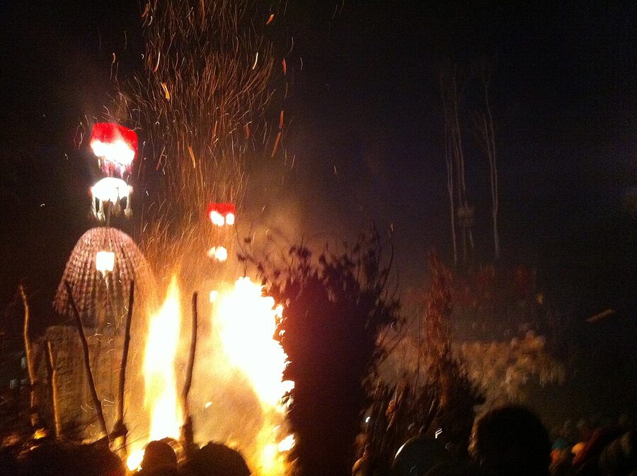 Hatsuakarikago lanterns lit by flames at the Dosojin Fire Festival, Nozawa Onsen