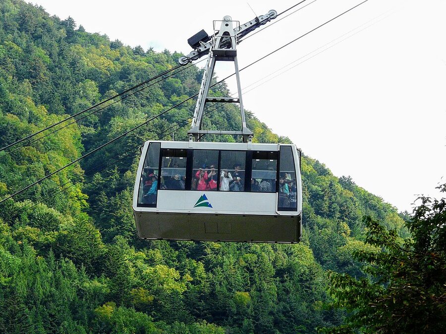 A Shin-Hotaka Ropeway gondola climbing toward the upper station