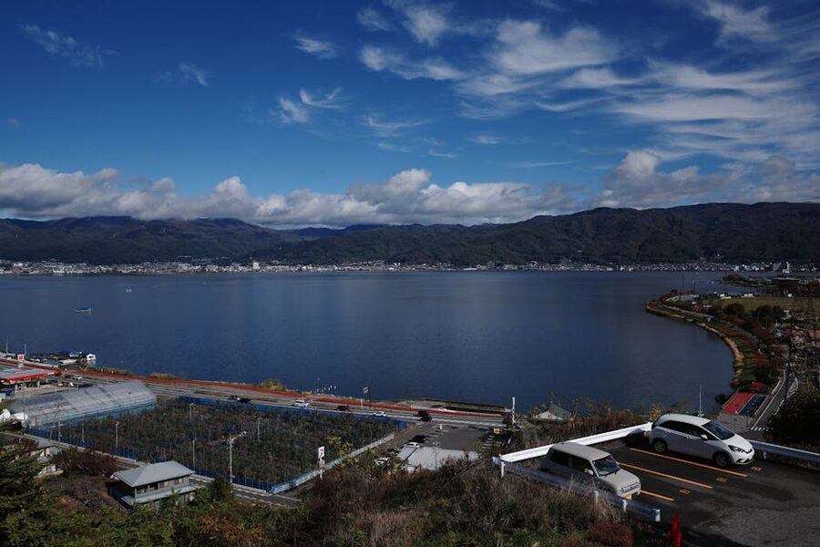 View of Lake Suwa with mountains in the background