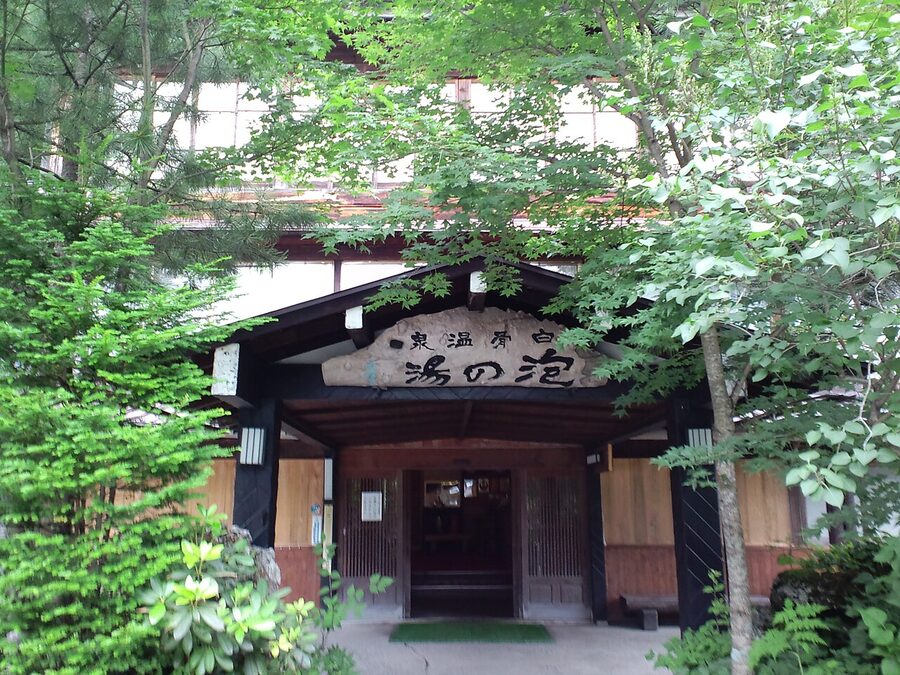 Awanoyu Ryokan exterior at Shirahone Onsen, traditional wooden building