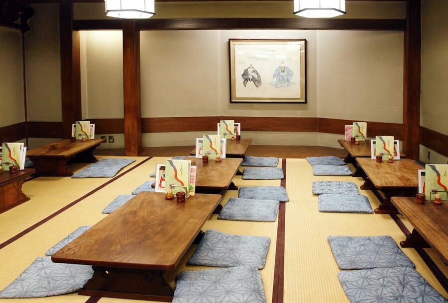 Traditional tatami ryokan room with low table and cushions
