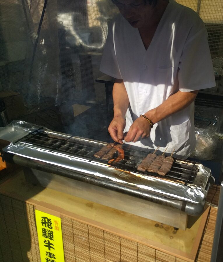 Hida beef skewers grilled on charcoal