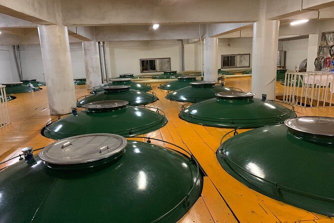 Takayama: Authentic Sake Tasting at a Historic Brewery - Entering Hirase Shuzo: seeing the factory and the kura