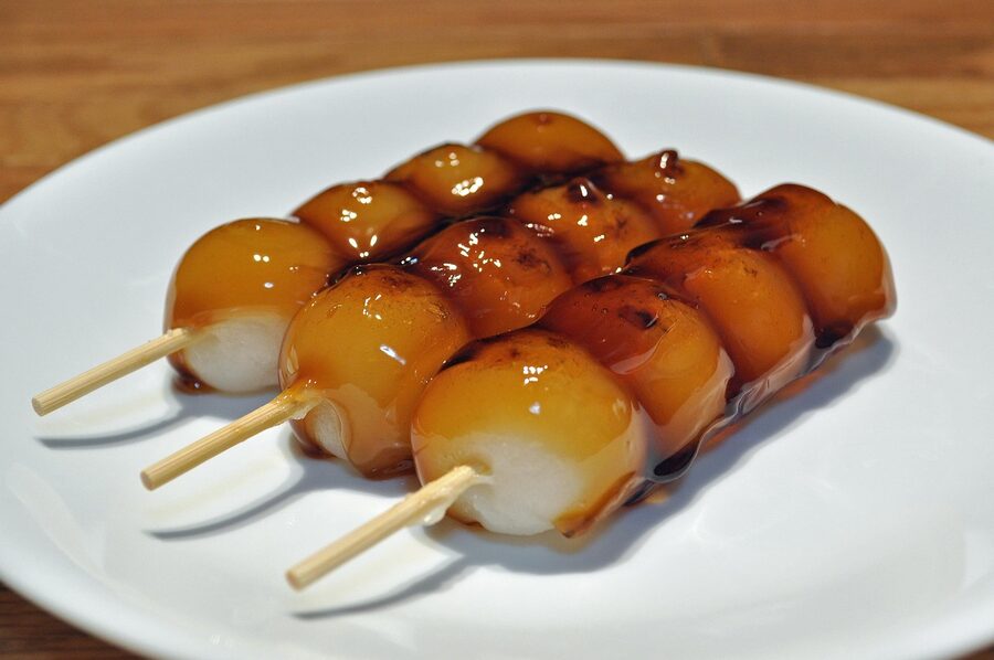 Mitarashi dango with glaze on a plate