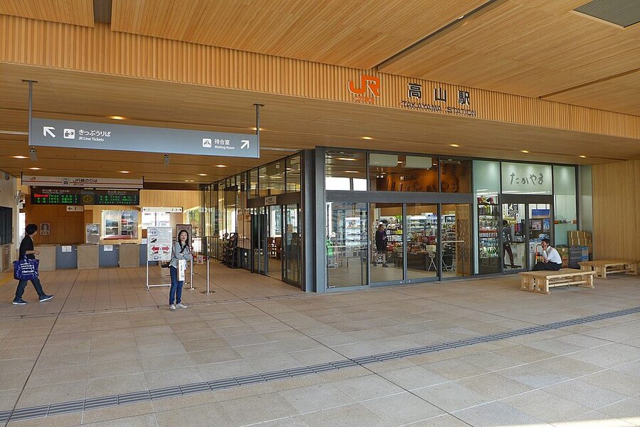 Front entrance of JR Takayama Station with the wooden facade