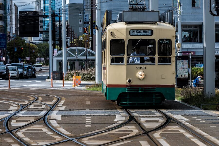 Vintage tram on a street in central Toyama