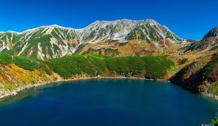 Tateyama autumn colour and volcanic lake reflection