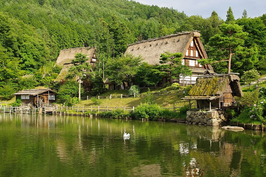 Snow-covered gassho roofs at Hida Folk Village in winter