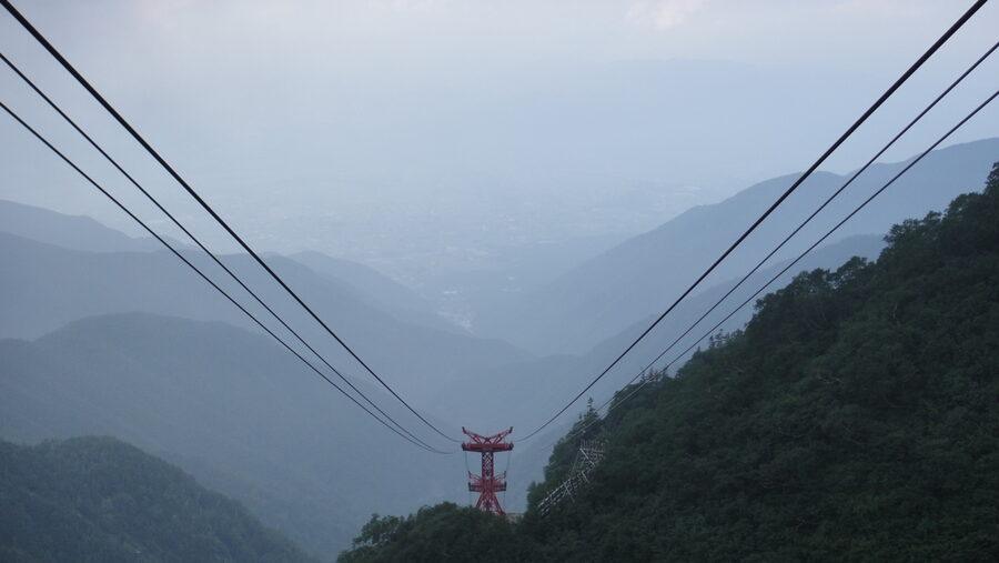 View from inside Komagatake Ropeway cabin climbing toward Senjojiki