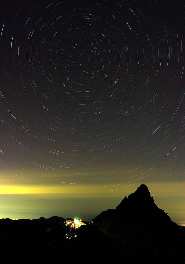 Circumpolar star trails over the silhouette of Mt Yarigatake